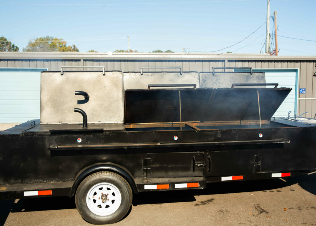 A large outside charcoal grill for rent owned by Holy City Grills.